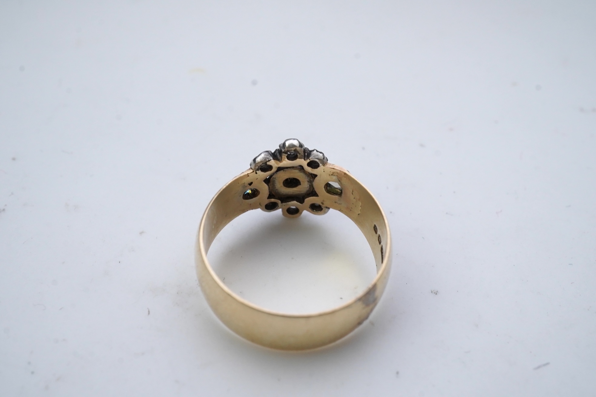 A gold and diamond ring